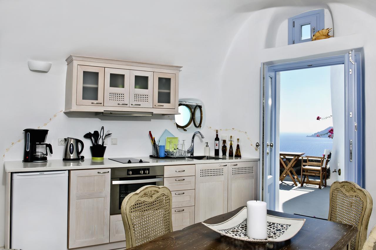 Anemomilos Oia  Ruang foto